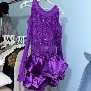 Purple open shoulder dance costume with mesh
